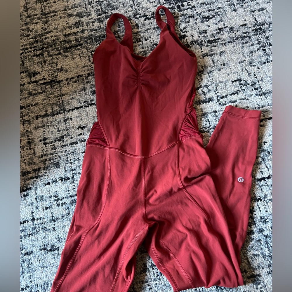 Lululemon   Orange Jumpsuit open back. One piece